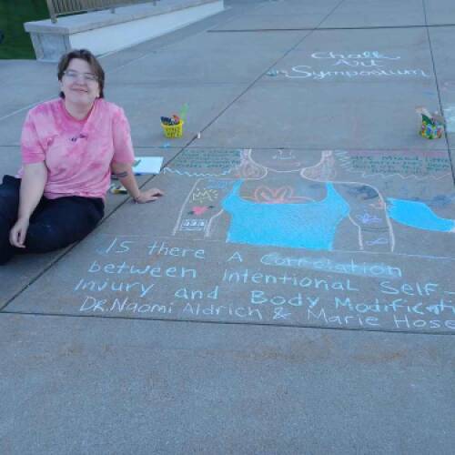 Psychology major Marie Hosep presents at GVSU Chalk Art Symposium